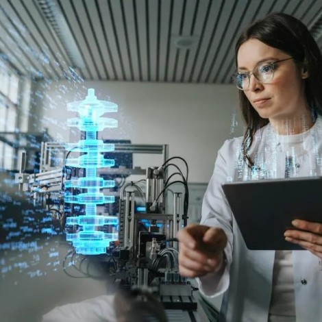 A scientist standing in a lab investigating a 3D model projected into the lab space