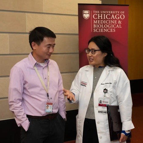Two researchers talking